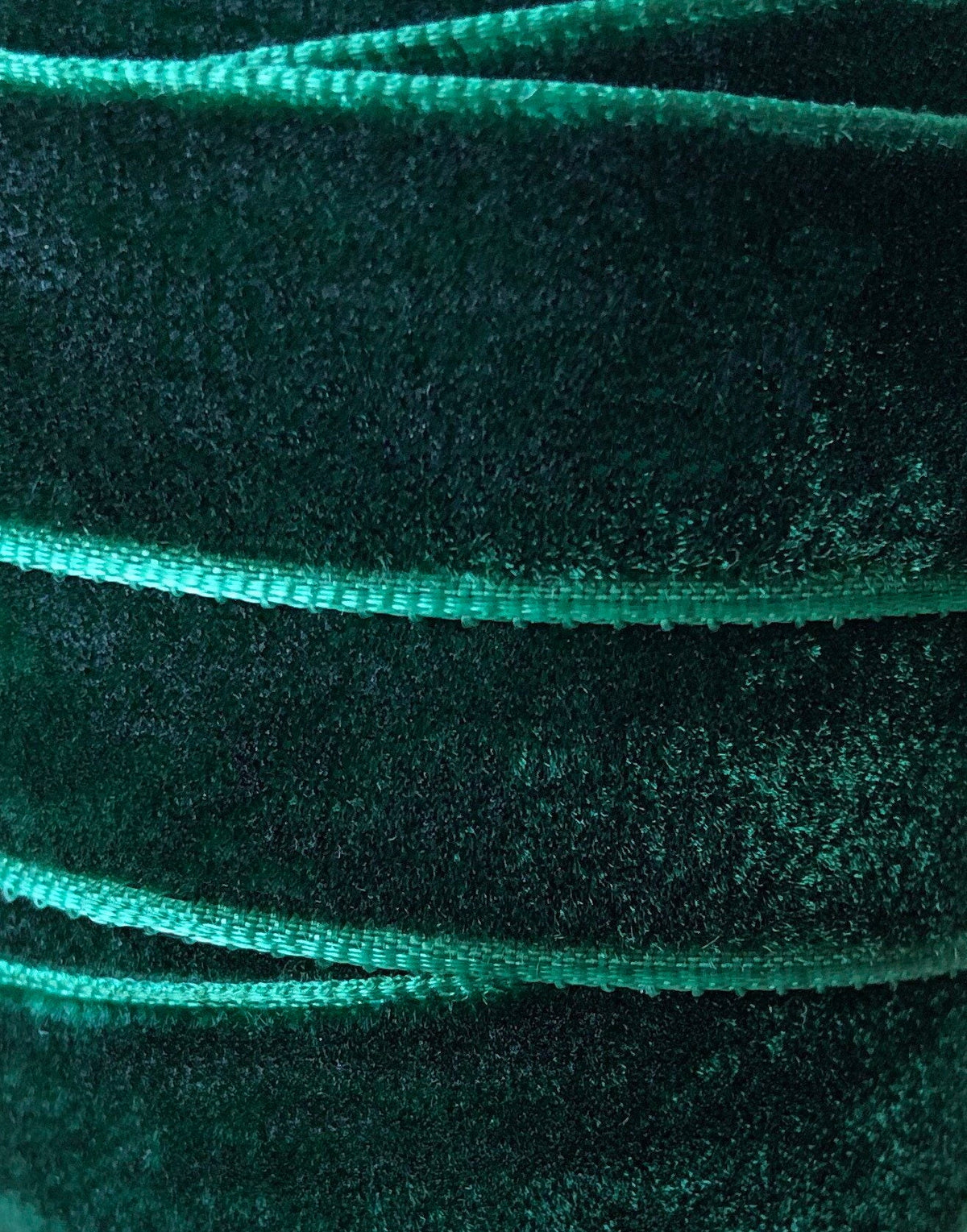 Emerald green velvet ribbon on large wooden spool, view 2