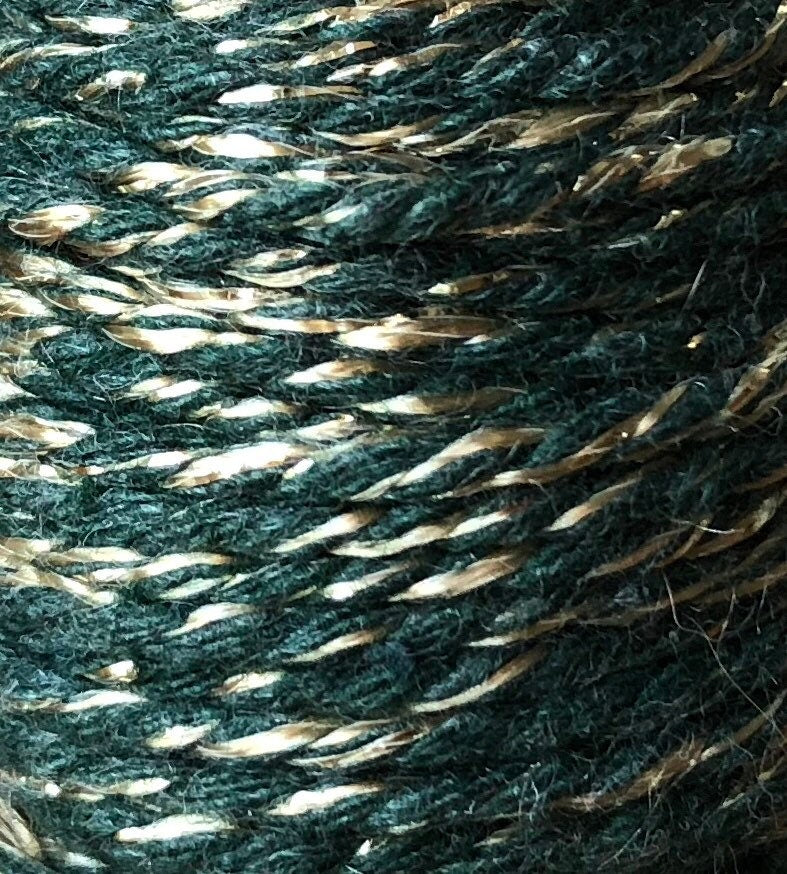 Green and gold glitter twine on wooden spool, view 2