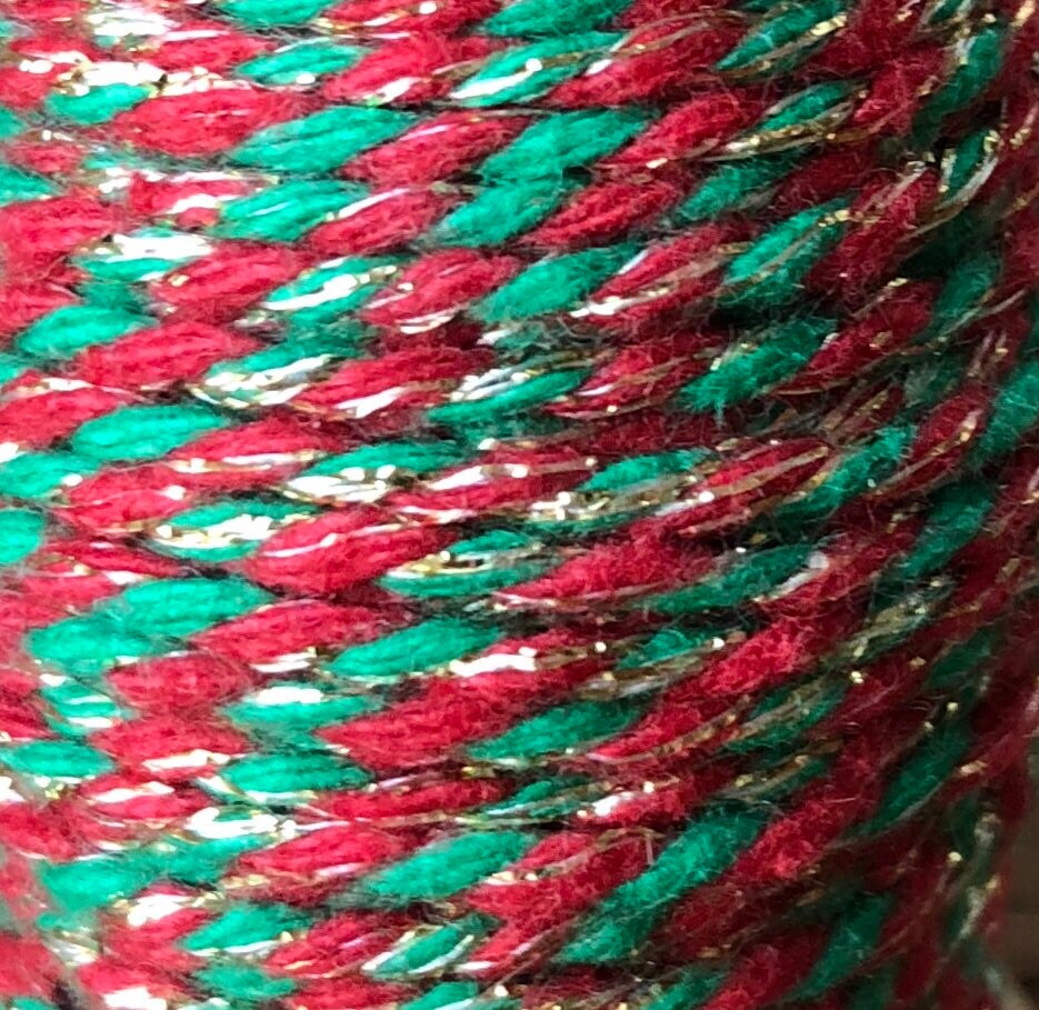 Red, green and gold glitter twine on wooden spool, view 2