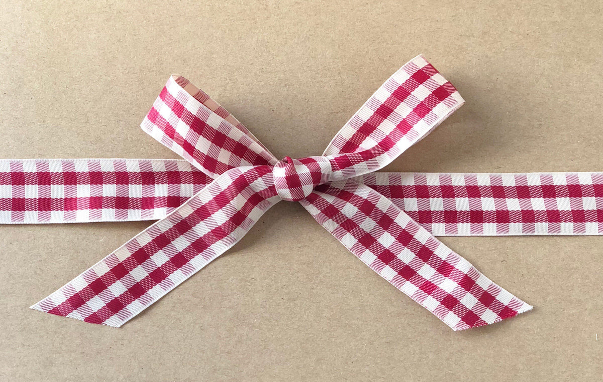 Red and cream gingham satin ribbon on wooden spool, view 2