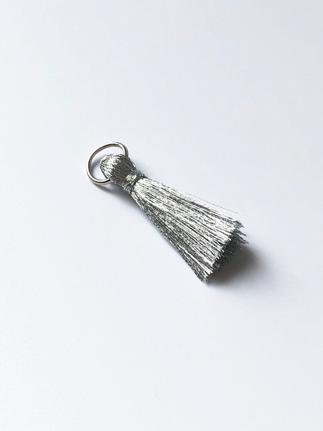 Gold and silver mini tassels with jump rings, view 2