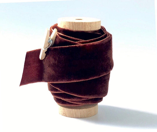 Dark brown velvet ribbon, 1 inch wide, on spool