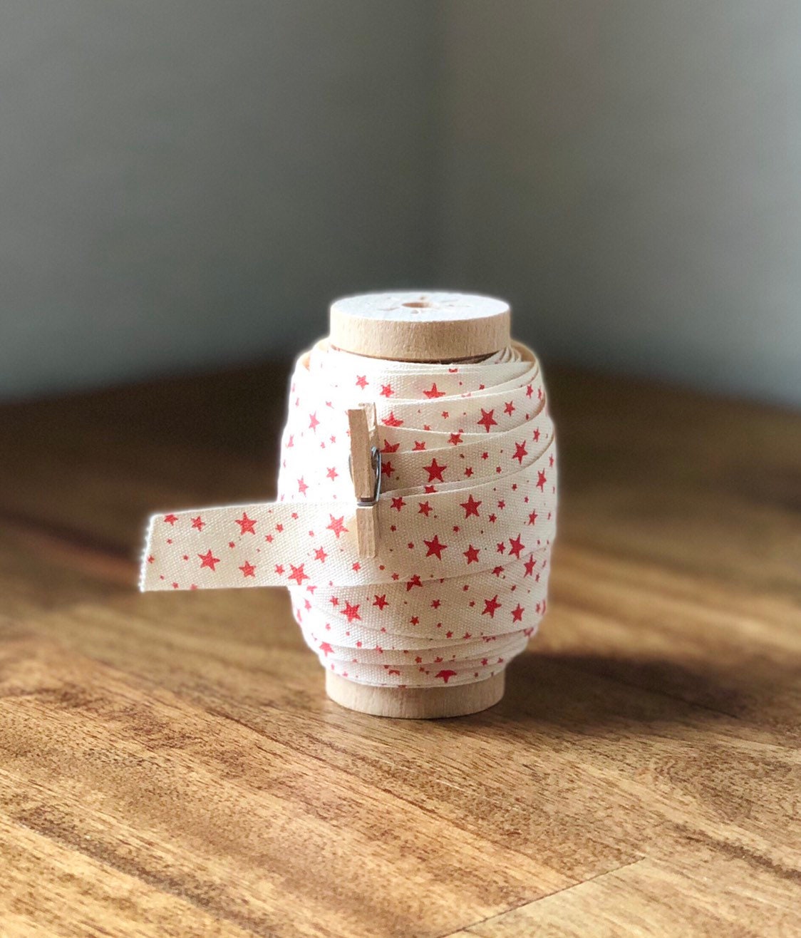 Cotton Christmas ribbon on wood spool, view 2