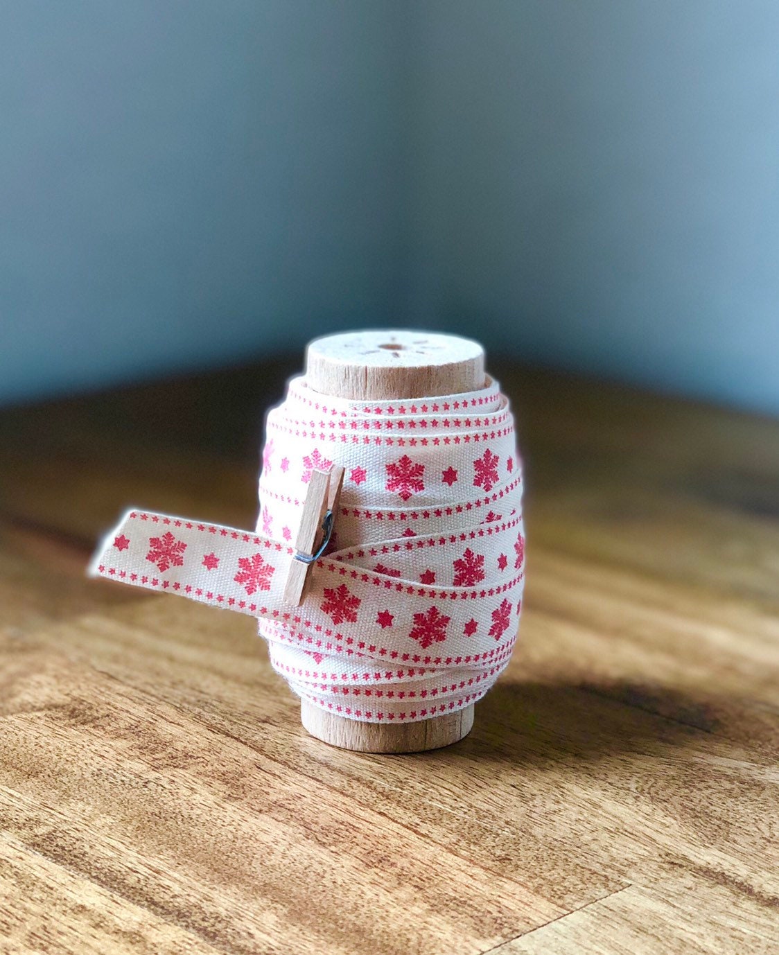 Cotton Christmas ribbon on wood spool, view 4