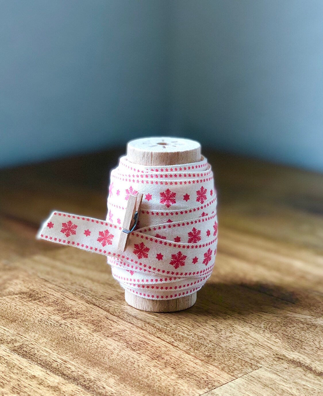 Cotton Christmas ribbon on wood spool, view 6