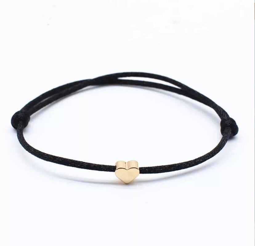 Adjustable cord bracelet with gold heart charm, view 2