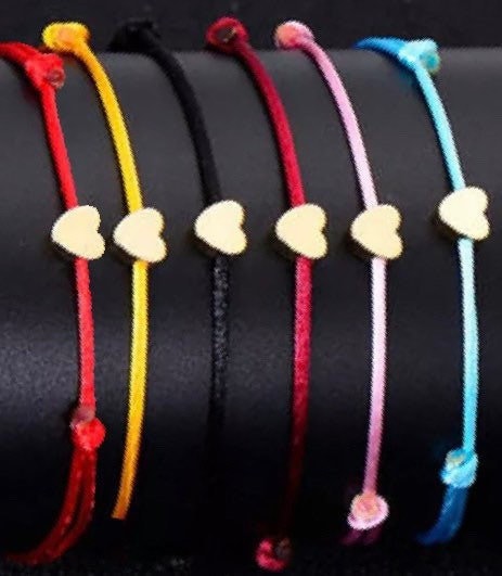 Adjustable cord bracelet with gold heart charm, view 3
